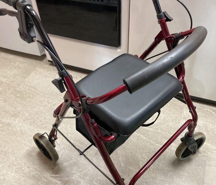 Red 4-wheel rollator