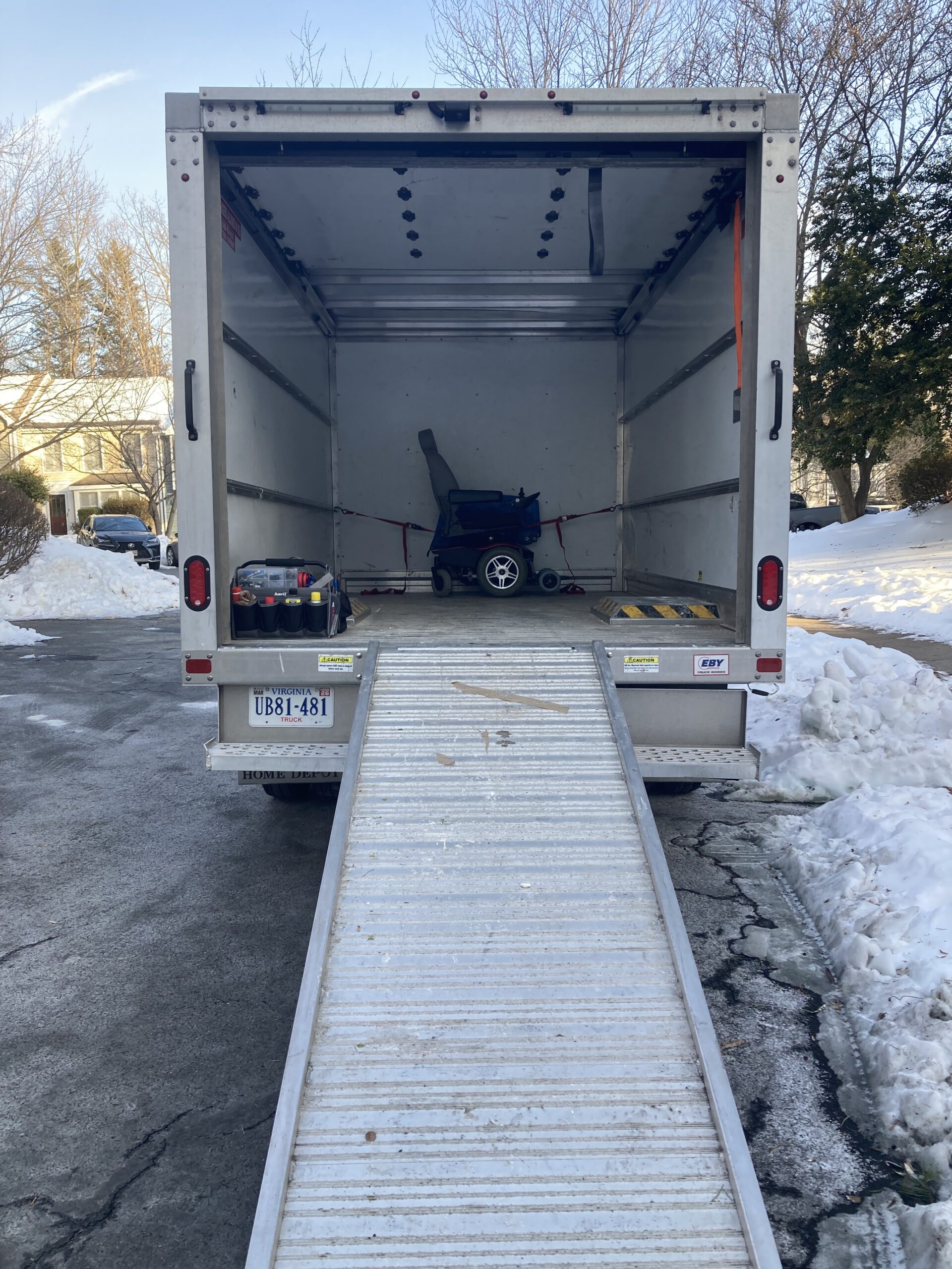 Power wheelchair in a delivery cube van