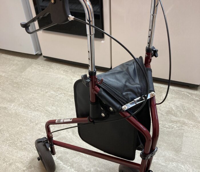 3-wheeled red rollator