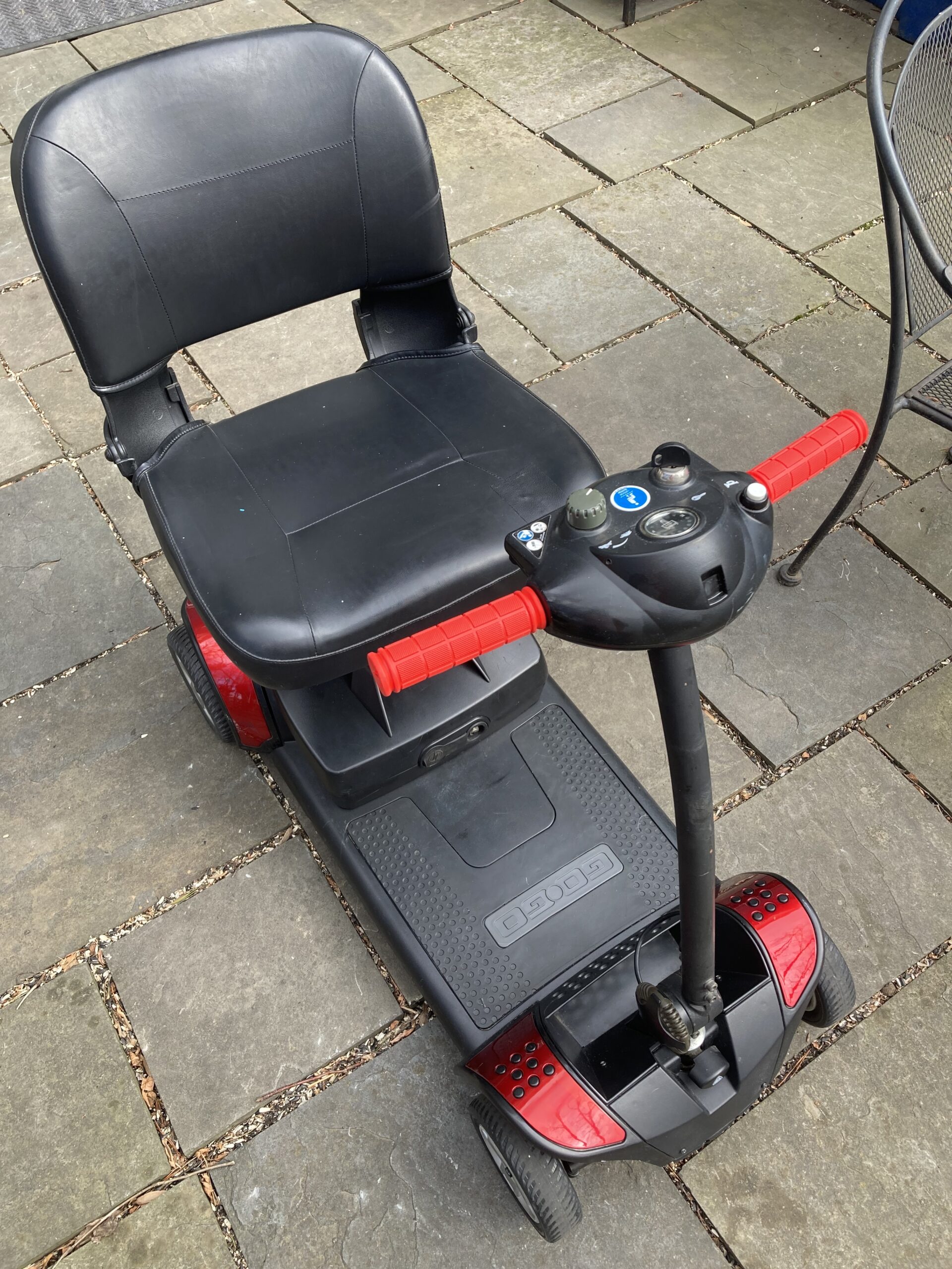 Red GoGo Elite mobility scooter, quarter front view
