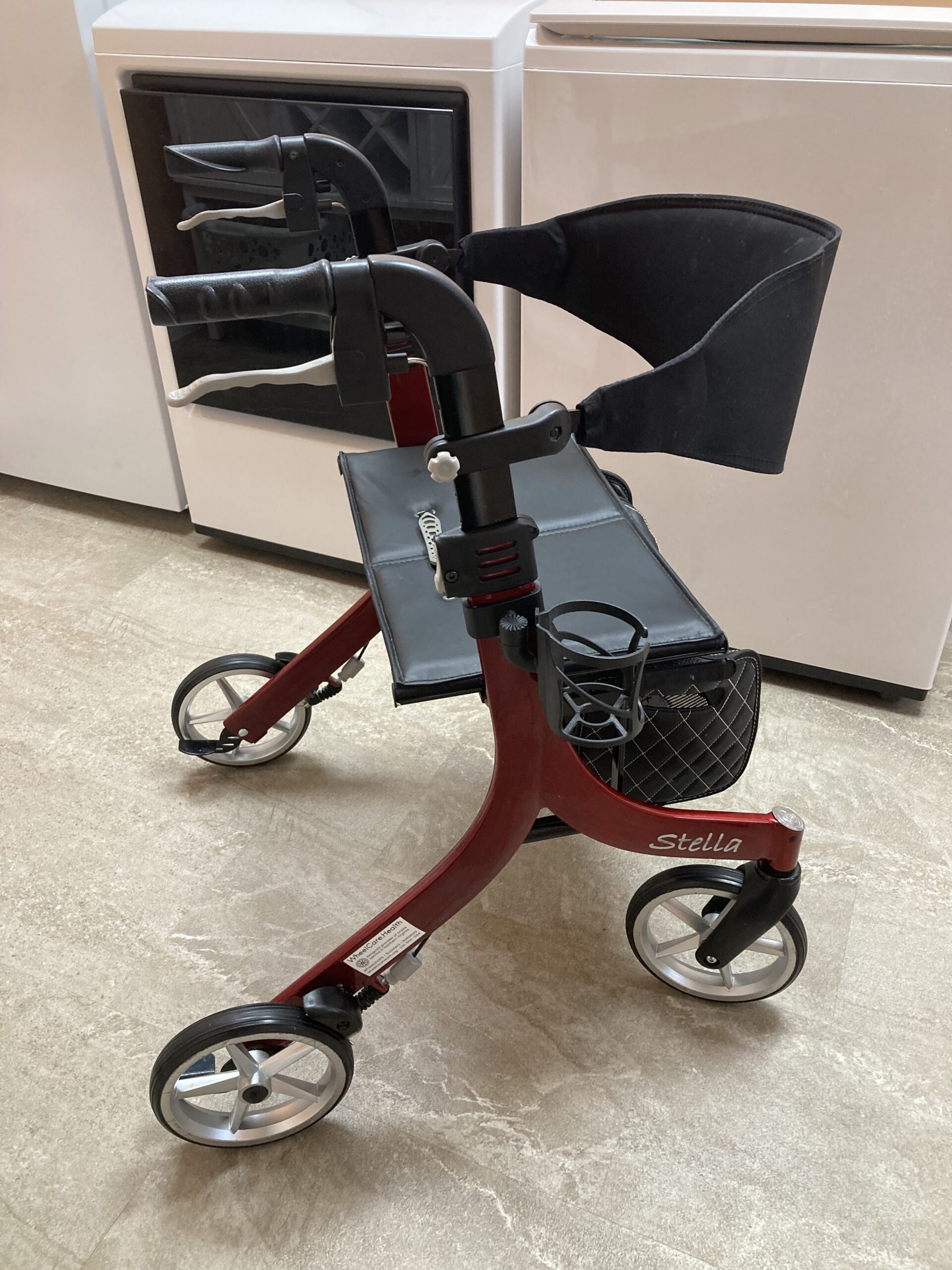 Stella brand rollator in dark red