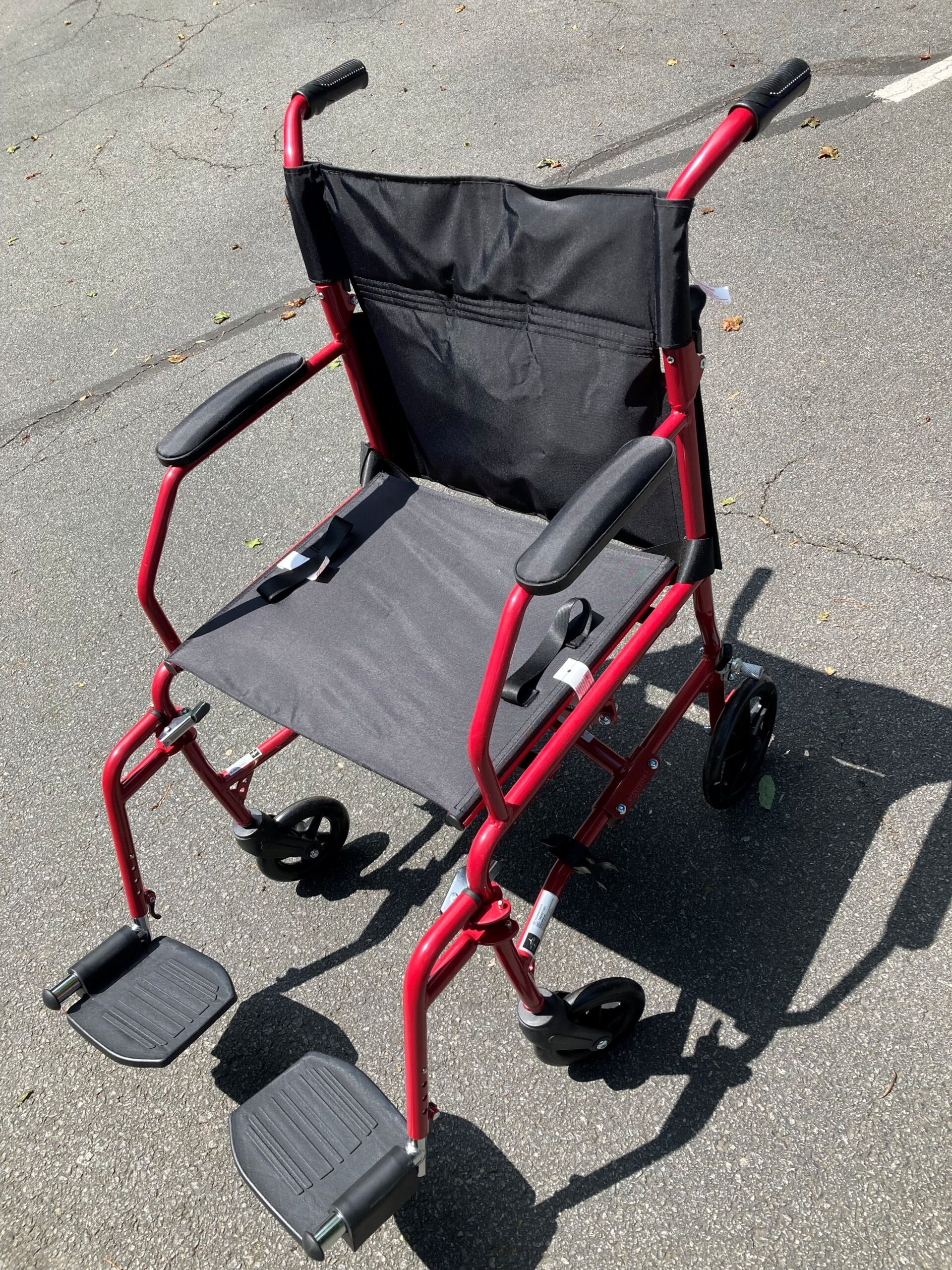 Red Medline brand transport wheelchair