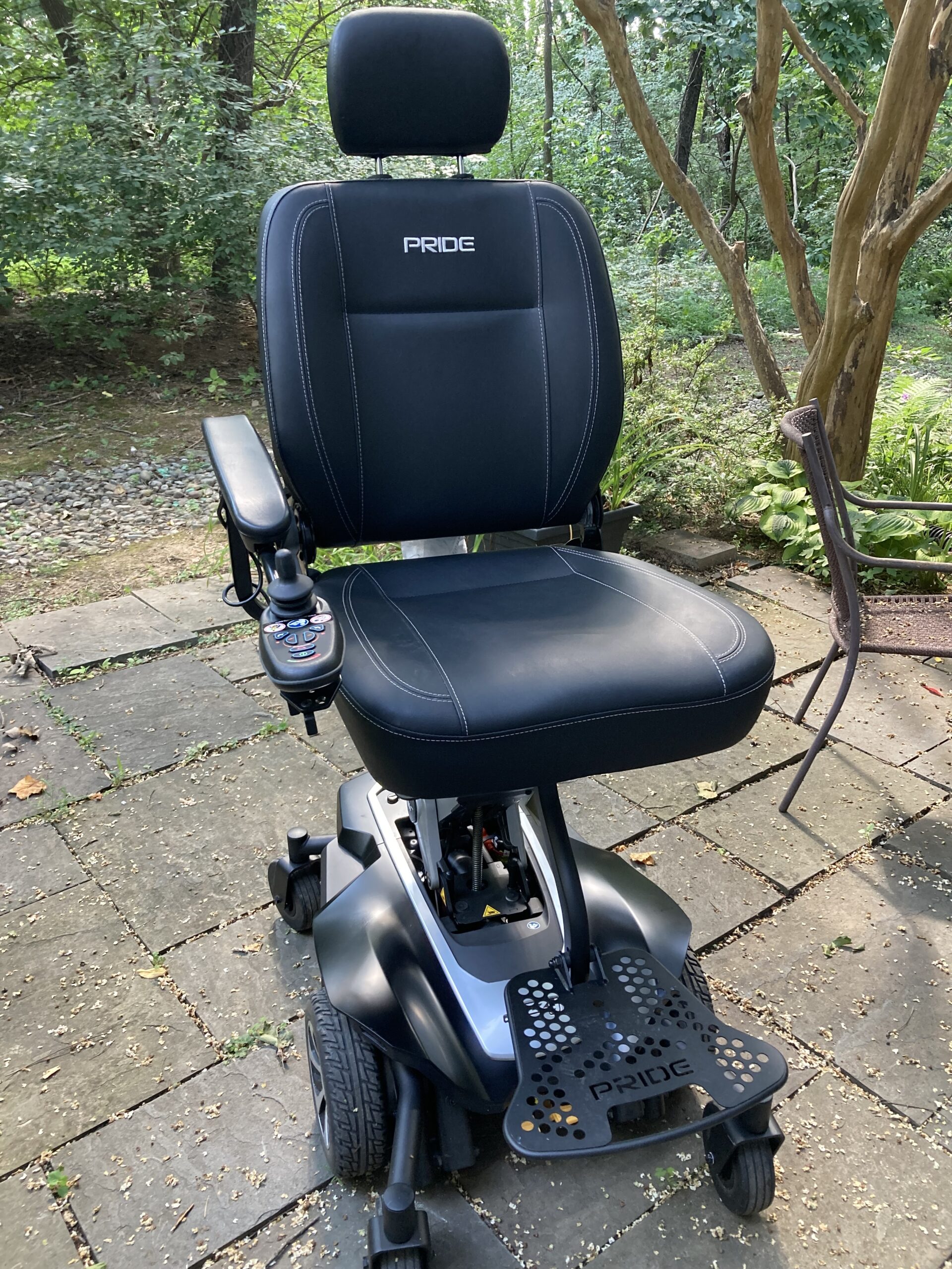 Pride Mobility power chair with lift feature